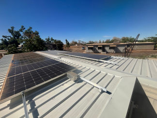 Solar panels on the roof of an Onslow senior citizens building