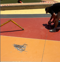 Worker repairing the Onslow Skate Park surface